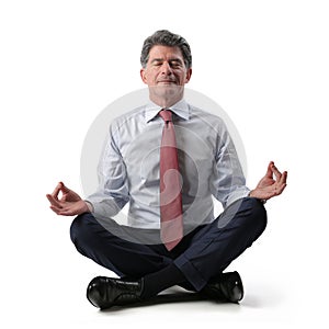 Businessman relaxing and doing yoga