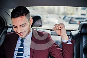 Businessman relaxing in his stretch limo