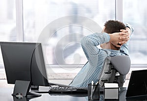 Businessman resting at desk