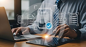 Businessman reviewing digital documents and checklists on futuristic interface