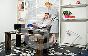 Businessman rich bearded guy sit office with lot of cash money. Man successful businessman phone conversation while