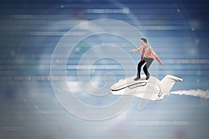 Businessman rides aircraft inside cyberspace