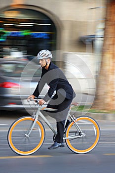 Businessman riding a bicycle