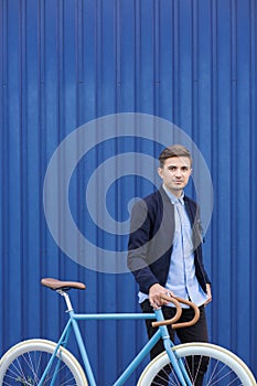 Businessman riding bicycle to work