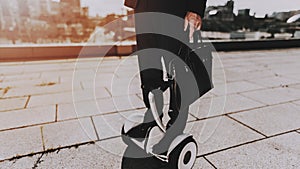 Businessman is Riding on Gyroboard