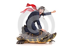 Businessman riding a turtle