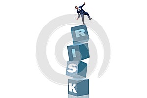 The businessman in risk and reward business concept