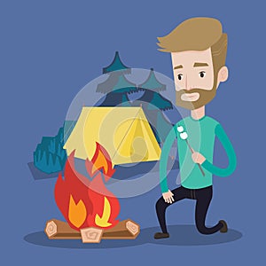 Businessman roasting marshmallow over campfire.