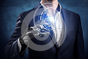 Businessman with robot hand touches virtual icon. 3d rendering.