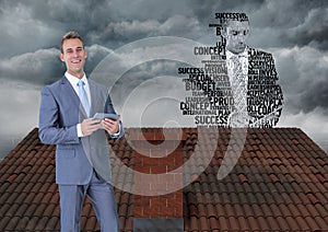 Businessman on roof with businessman silhouette made of words