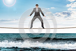 Businessman on rope