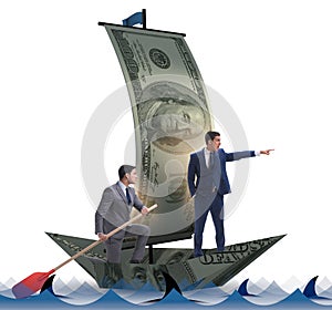 Businessman rowing on dollar boat in business financial concept