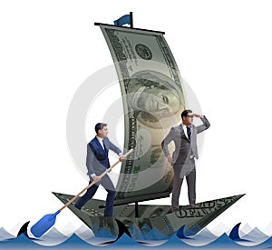 Businessman rowing on dollar boat in business financial concept