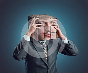 Businessman with rubik cube head photo