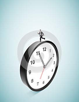 Businessman runing on clock