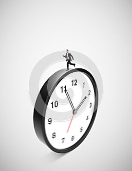 Businessman runing on clock