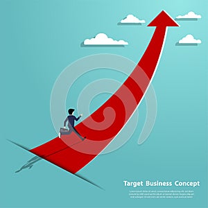 Businessman running on arrow pointing up to the success