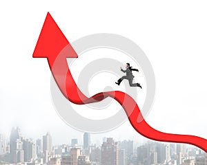 Businessman running on arrow up bending trend line with cityscape