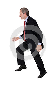 Businessman running away