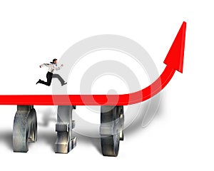 Businessman running on growing red arrow