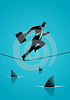 Businessman running on rope with sharks underneath