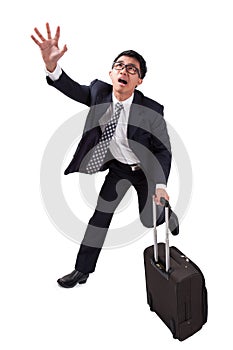 Businessman running with suitcase