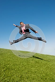 Businessman rushing to work photo