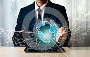 A businessman\'s hand grasps a global network, a global corporation, an internet network connection, Internet of Things