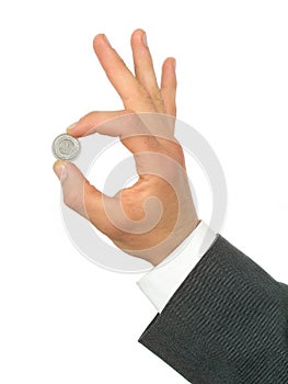 Businessman's Hand Holding Coin