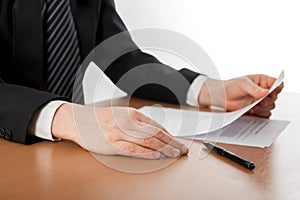 Businessman's hand signing papers. Lawyer, realtor, businessman