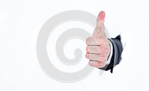 Businessman`s hand with a thumb gesture up