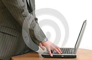 Businessman's hands on laptop