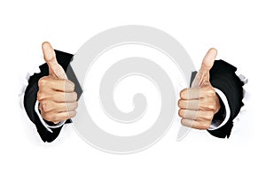 Businessman's hands with thumbs up
