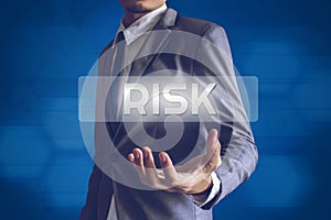 Businessman or Salaryman with Risk text modern interface concept photo