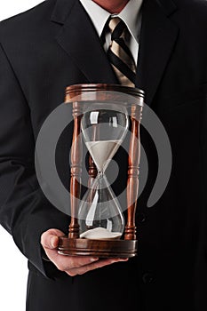 Businessman with sand timer