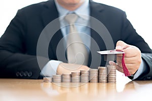 Businessman saveing for eudcation