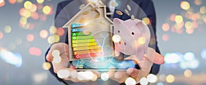 Businessman saving money with good energy chart rating 3D render