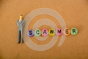 a businessman with a scammer\'s text, need for awareness and caution while conducting business transactions online