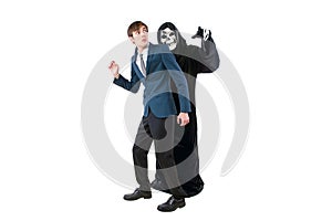 Businessman Scared of a Man Wearing a Ghost Costume on Halloween