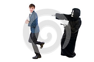 Businessman Scared of a Man Wearing a Ghost Costume on Halloween