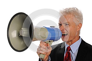 Businessman screaming with a megaphone