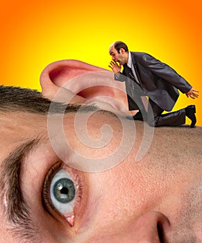 Businessman screaming to ear