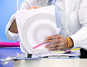 Businessman searching for the document