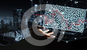 Businessman searching solution of a complicated maze