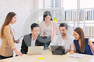 Businessman and secretary with team business working together using laptop computer at modern office, Lifestyle business work at