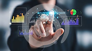Businessman interacting with virtual data visualization interface