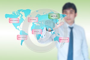 Businessman selecting Asia button