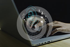 A businessman selects a lock icon on a virtual display. Internet network security concept, website connection. to prevent hackers