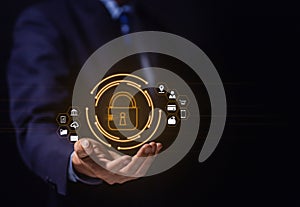 Businessman selects a lock icon on a virtual display. Internet network security concept, website connection. to prevent hackers