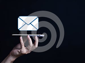 Businessman sending a letter from a computer. electronic mail concept is online communication on the Internet network Receiving